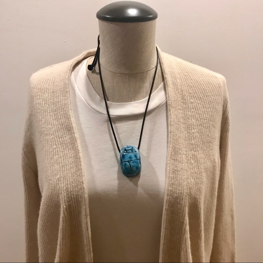 Blue ceramic scarab pendant necklace. NWOT